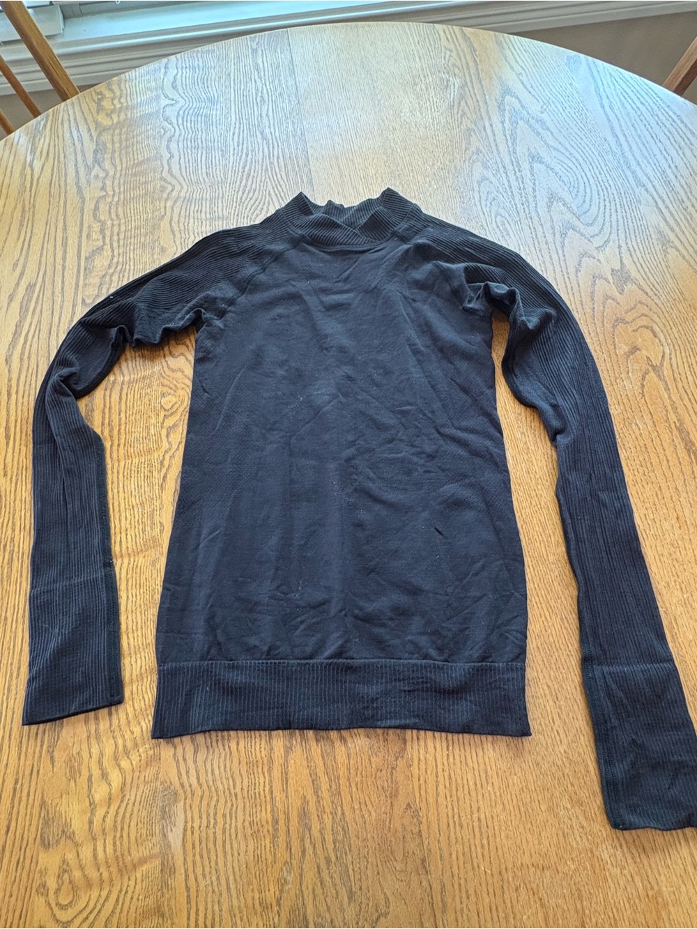 Lululemon Restless Mock Neck fitted long sleeve pullover black size 4.